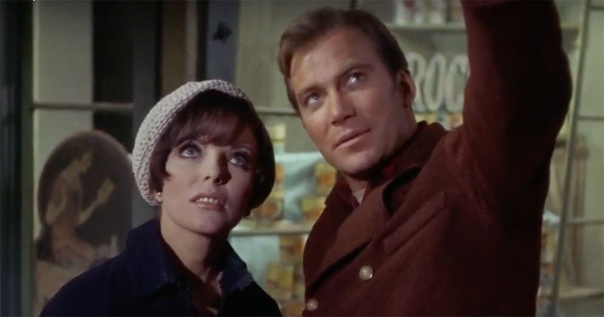 Captain Kirk and Edith Keeler looking upward during a moment from The City on the Edge of Forever in Star Trek.