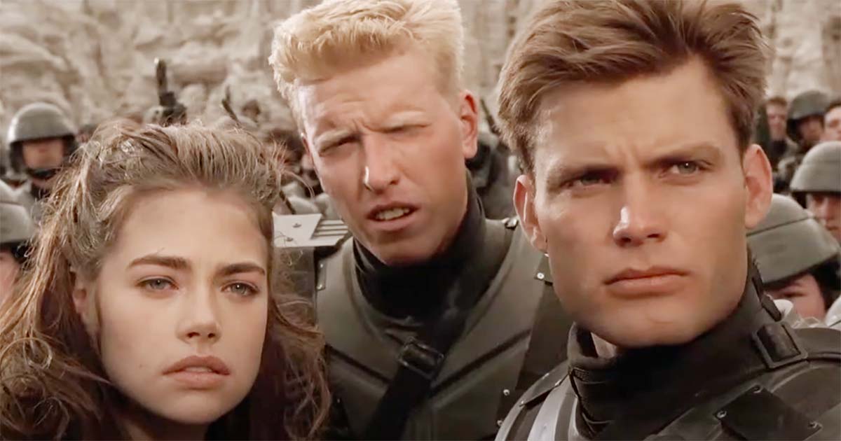 Carmen Ibanez, Sergeant Zim, and Johnny Rico in Mobile Infantry gear in "Starship Troopers."