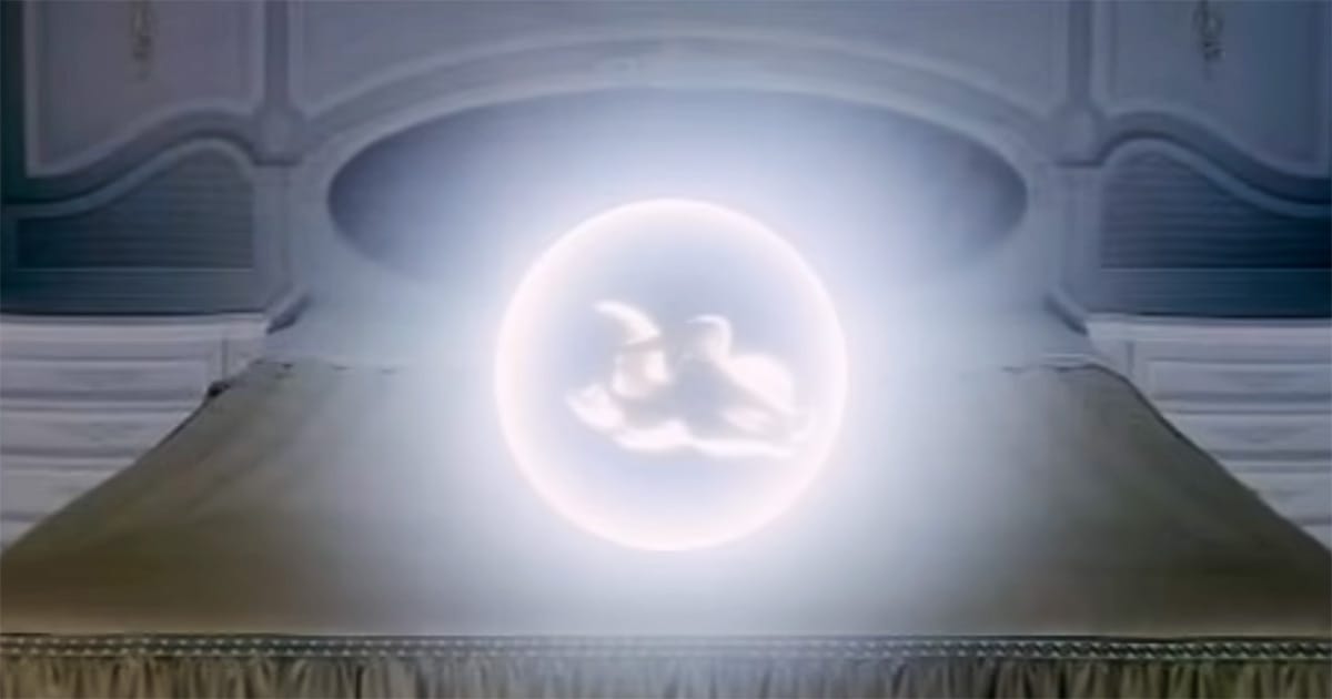 Glowing Star Child floating above the bed in the final scene of "2001: A Space Odyssey"