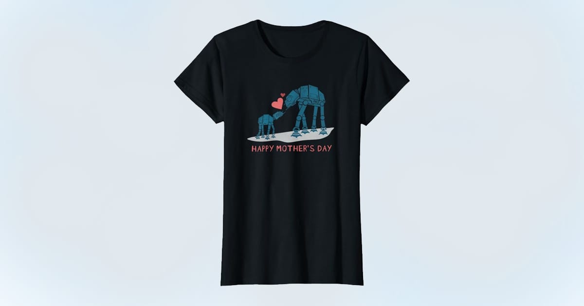 Black T-shirt featuring a mother and baby AT-AT with hearts and the text “Happy Mother’s Day” in a Star Wars-themed illustration.