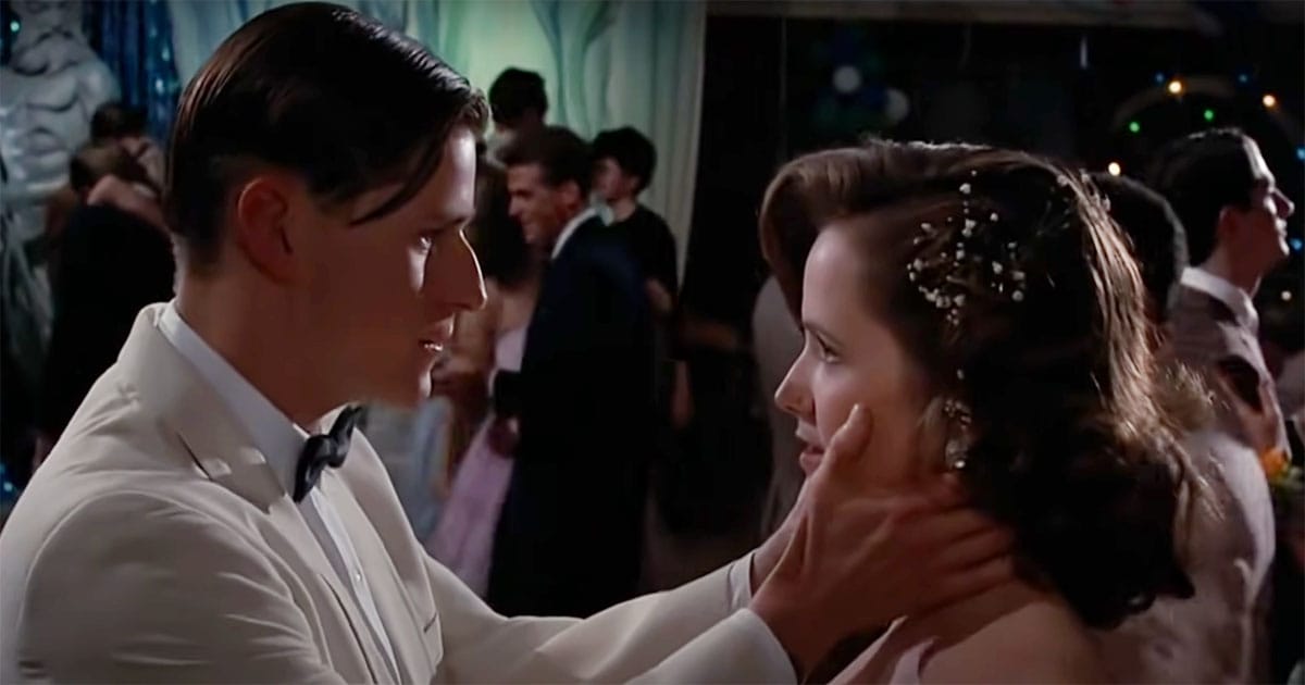 George McFly and Lorraine Baines dancing at the Enchantment Under the Sea dance in "Back to the Future," sharing a key moment that secures their future—and Marty’s existence.