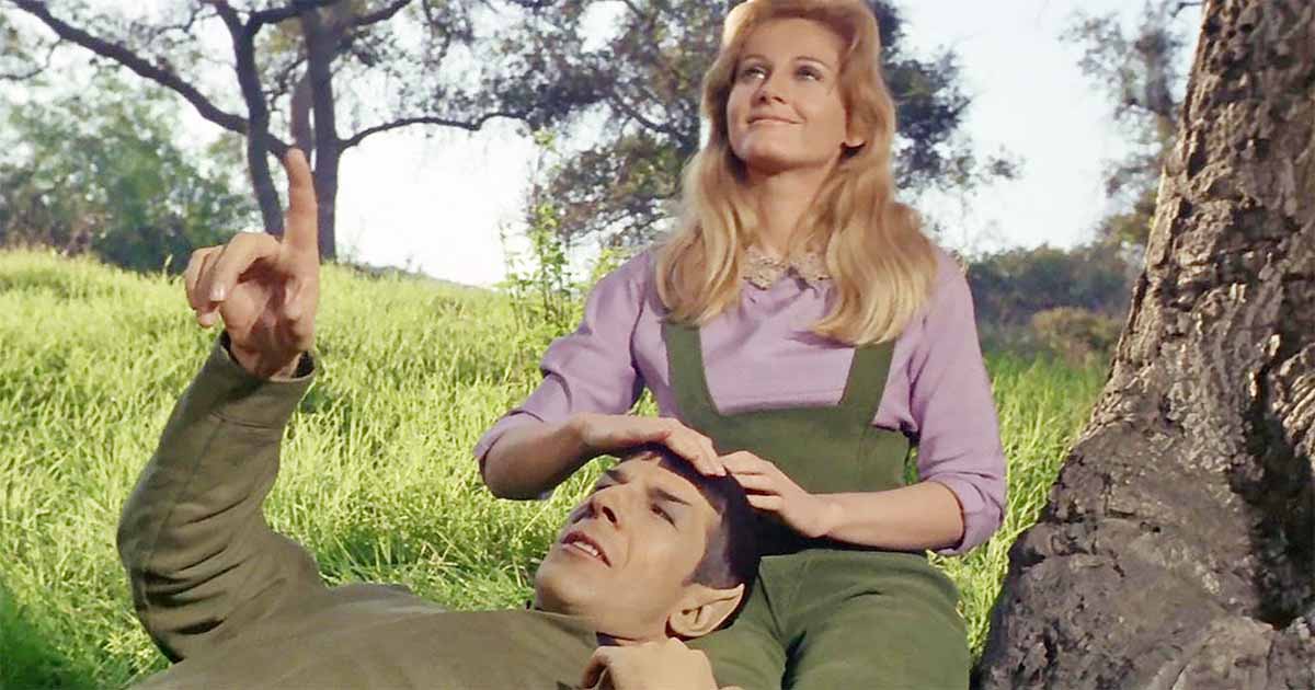 A screen capture showing Spock reclining on a woman's lap.