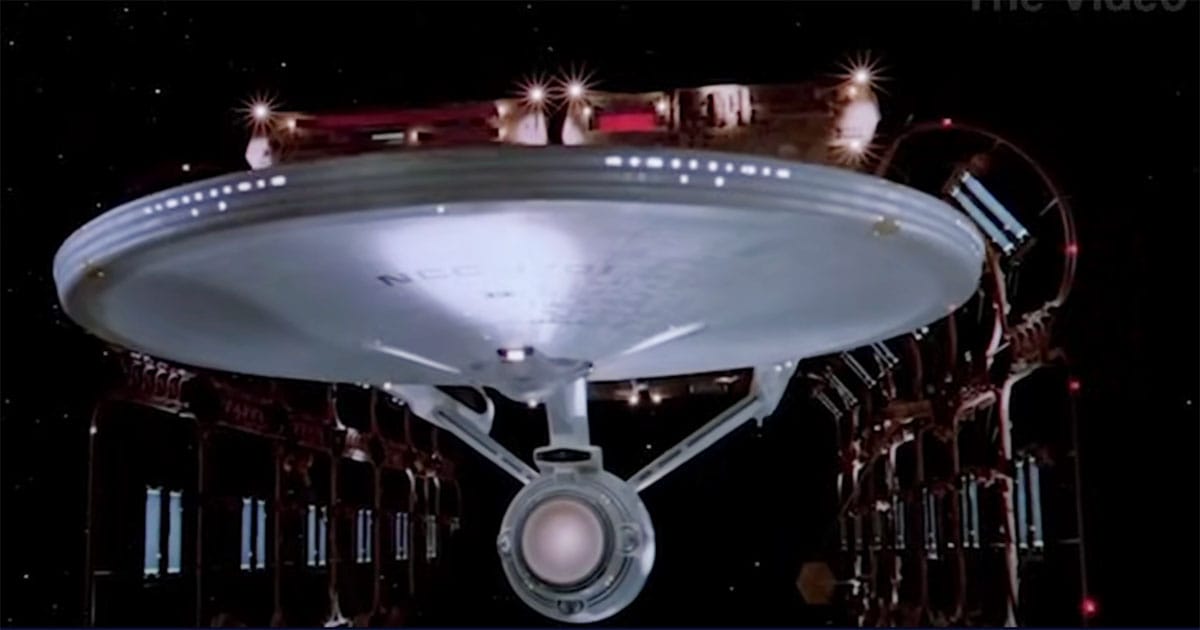 The U.S.S. Enterprise NCC-1701 in drydock, fully restored and illuminated, symbolizing the ship’s lasting role as the heart of the "Star Trek" universe.