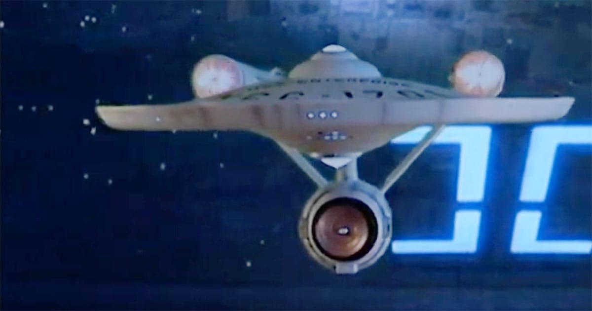 Front view of the U.S.S. Enterprise NCC-1701 approaching a docking bay, representing stability and continuity in "Star Trek: The Original Series."