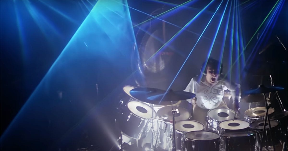 Keith Moon of The Who playing drums beneath blue and green laser beams during a 1970s concert lighting test used in "Alien"