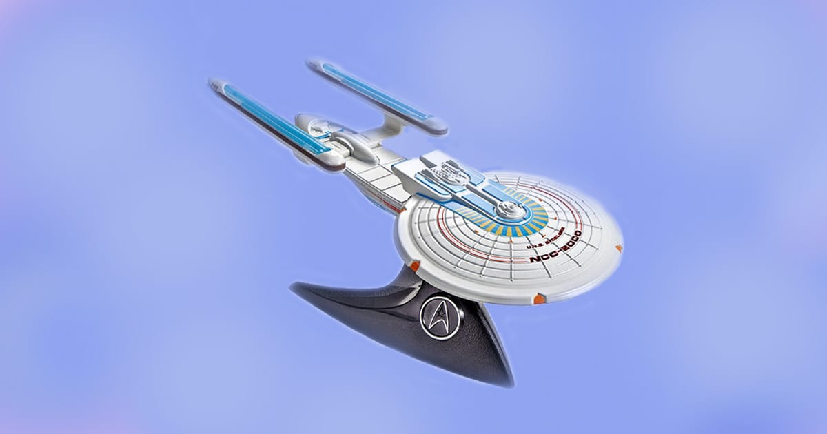 Hot Wheels Star Trek USS Excelsior NCC-2000 scale model starship on display stand.