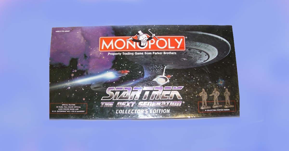 Collector's edition Star Trek The Next Generation Monopoly board game box featuring USS Enterprise and pewter tokens.