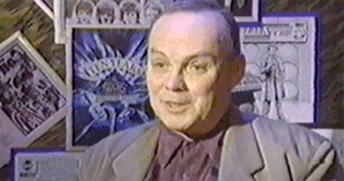 Roy Skelton speaking in an interview with Doctor Who artwork and Dalek images in the background