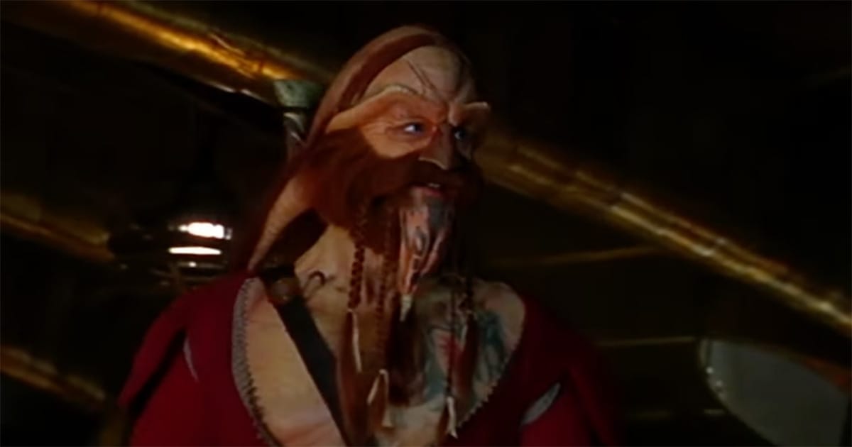 D’Argo alone on Moya in "Farscape," burdened by memories and unresolved pain.