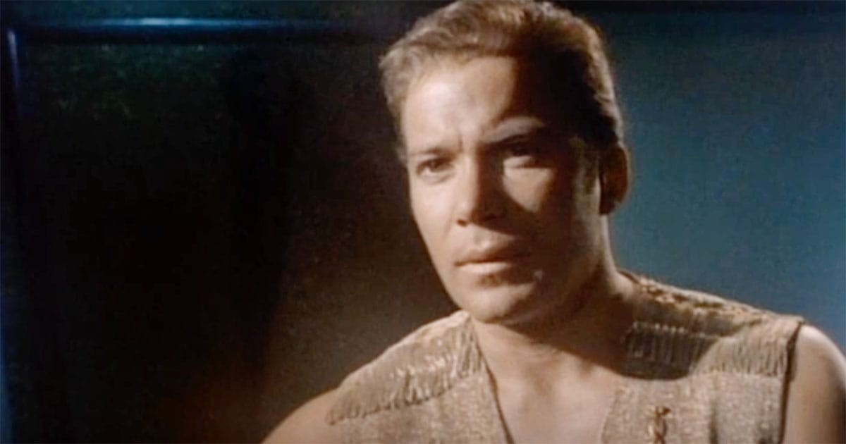 Captain Kirk in a reflective moment wearing mirror universe uniform from “Mirror, Mirror”