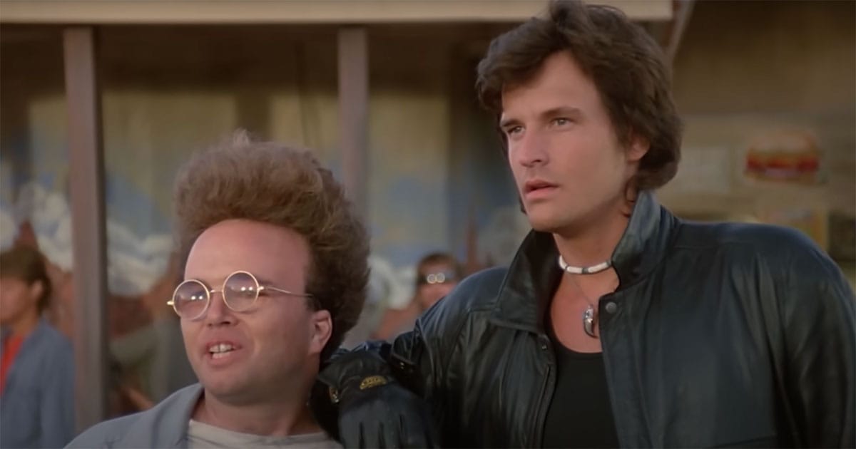 Two members of Packard’s gang from "The Wraith," showing off the film’s eccentric 1980s villain style and campy tone.
