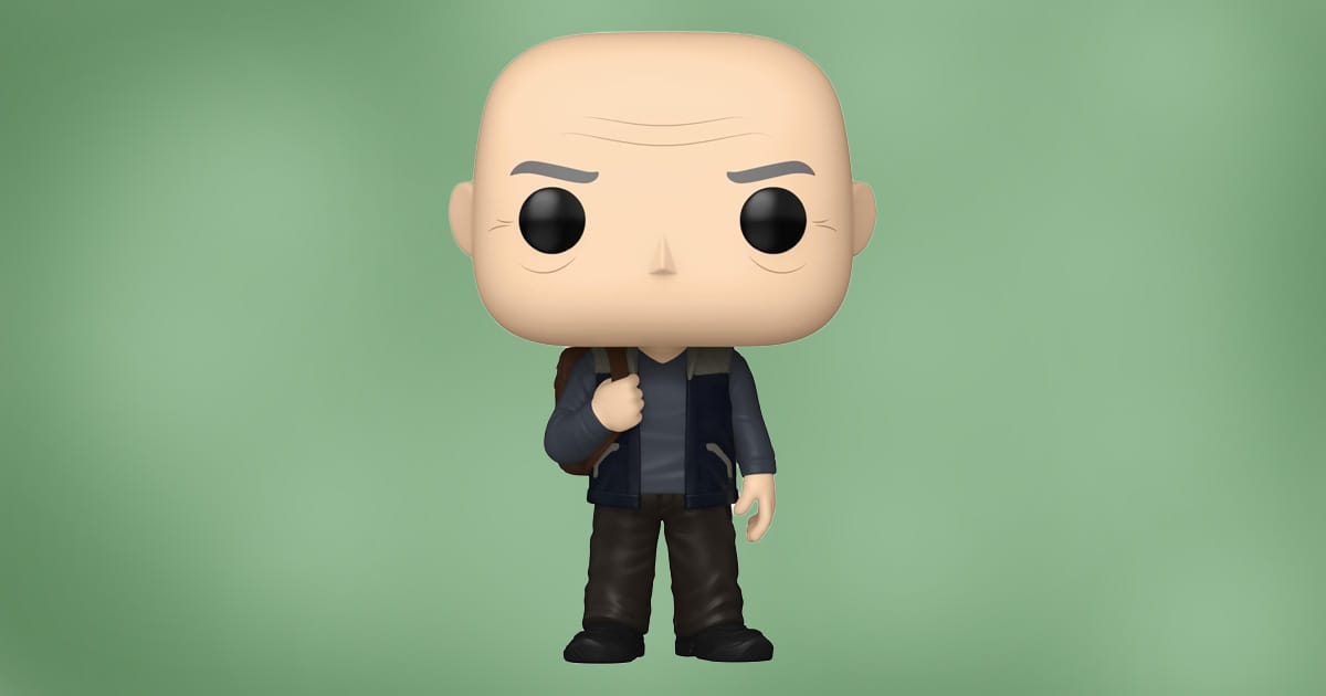 Funko Pop figure of Jean-Luc Picard in civilian clothes from Star Trek: The Next Generation, wearing a jacket and carrying a backpack, against green background.