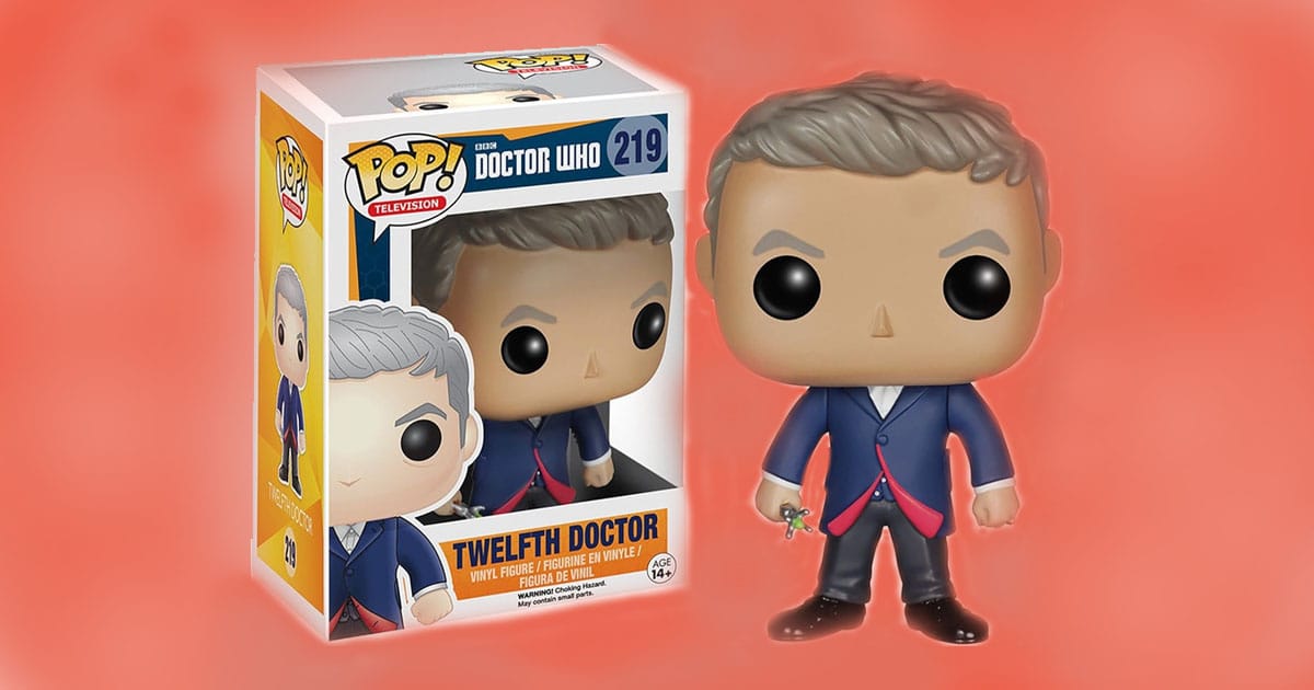 Funko POP Twelfth Doctor figure from Doctor Who, featuring a blue coat with red lining and holding a sonic screwdriver, shown beside its original box.