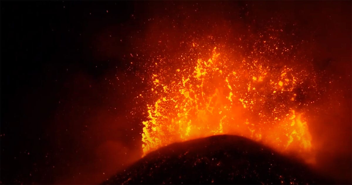 Mount Etna erupting in 2002 with molten lava and glowing ejecta, used to create Mustafar’s volcanic landscape in "Revenge of the Sith."