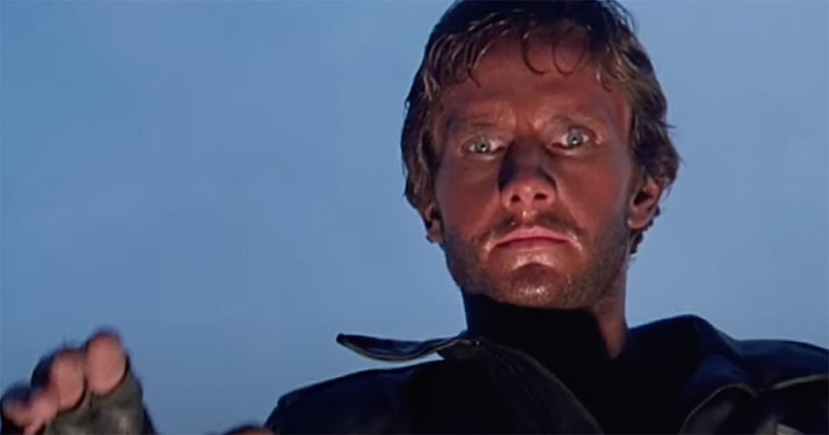 Dogen from "Metalstorm" looking determined under a stark blue sky.
