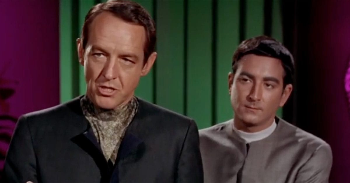 Close-up of Commissioner Nilz Baris speaking in “The Trouble with Tribbles” episode of Star Trek.