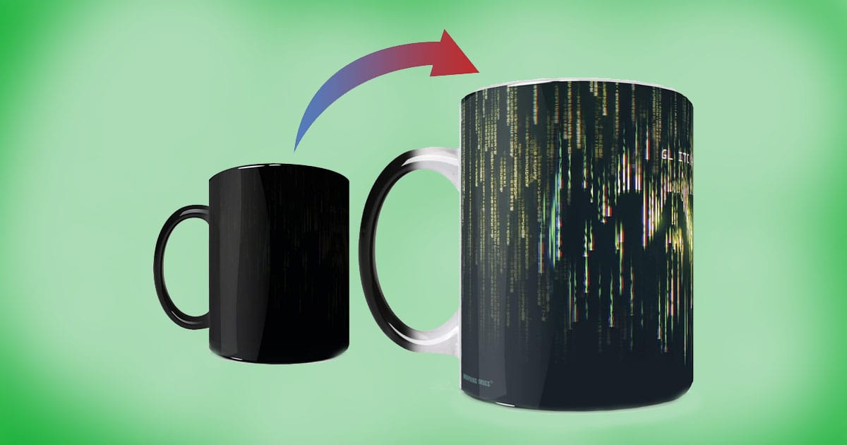 The Matrix Glitch Morphing Mug, 11 oz ceramic heat-sensitive coffee cup that reveals green digital code design when hot liquid is added.