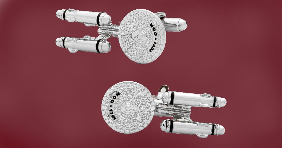 Pair of silver Star Trek cufflinks designed as the USS Enterprise NCC-1701 starship.