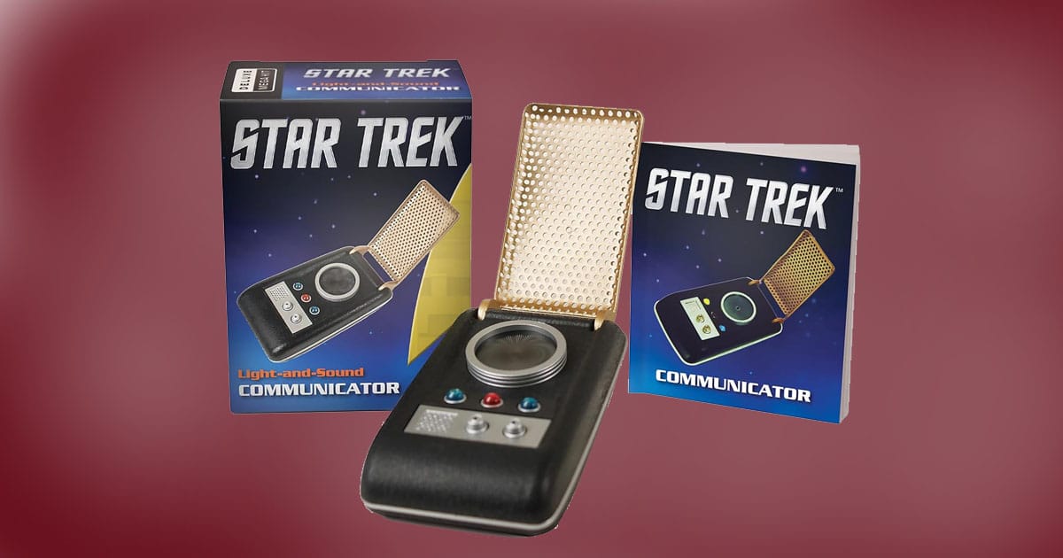 Star Trek Light-and-Sound Communicator replica with box and booklet, inspired by The Original Series.