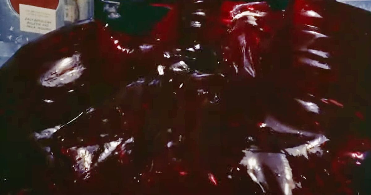 The Blob 1958 film image showing the alien creature spreading across the screen.