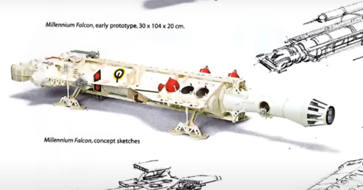 Original Millennium Falcon prototype model resembling a long dart with concept sketches in the background.