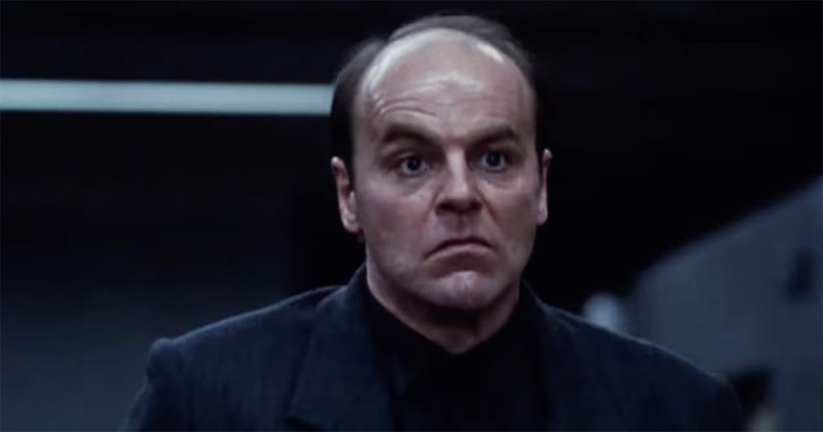 Total Recall 1990 villain Cohaagen Ronny Cox symbol of corporate control and corruption in science fiction.