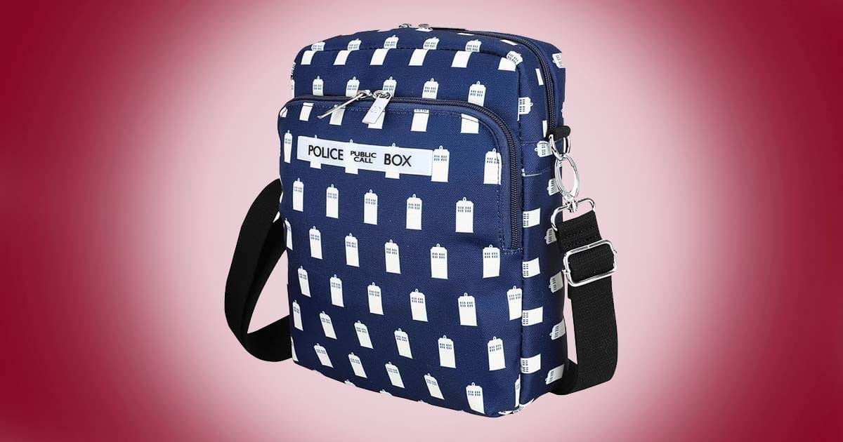 Doctor Who TARDIS crossbody messenger bag in navy blue with white police box pattern and adjustable black strap on red background.