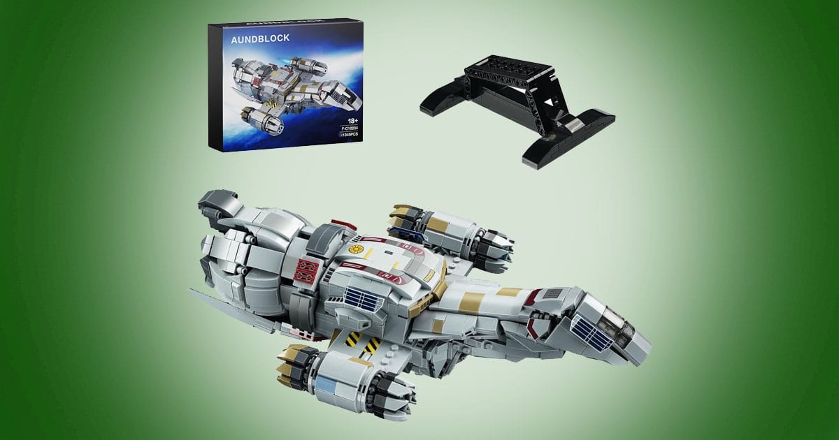 Lego-compatible Firefly-class spaceship building set shown with display stand and packaging on green background.