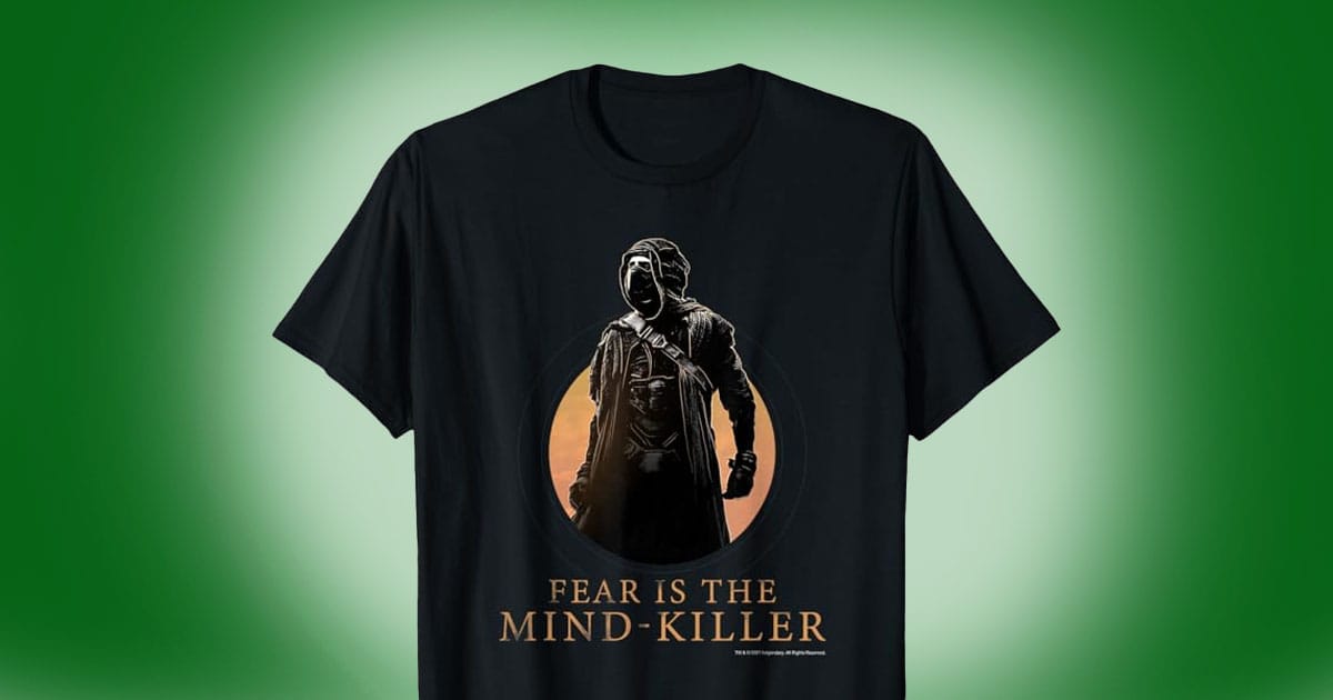 Black Dune T-shirt featuring Paul Atreides in a stillsuit with the phrase “Fear is the Mind-Killer” printed below the image.