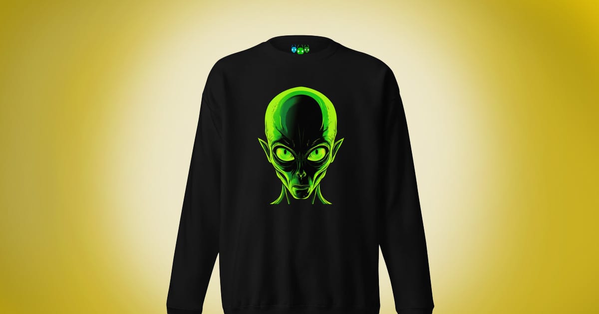 Black sweatshirt featuring a vivid green alien head glowing against a gold background.