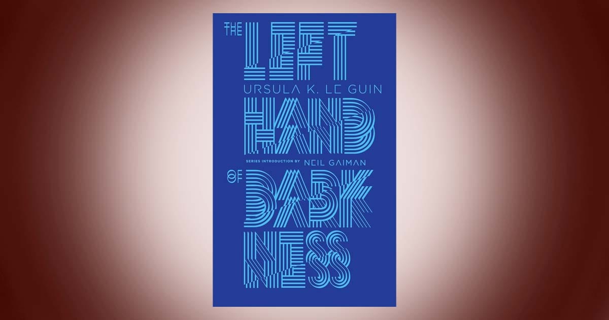 Cover of The Left Hand of Darkness by Ursula K Le Guin classic science fiction novel Penguin Galaxy edition with blue geometric text design.