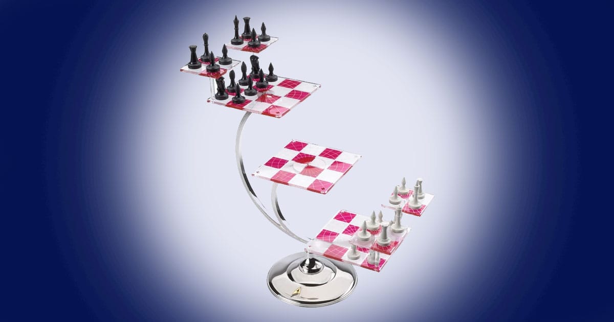 Star Trek tridimensional chess set with layered transparent boards and black and silver pieces arranged on multiple levels.