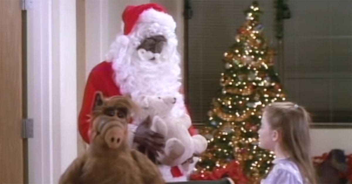 ALF with a Santa Claus visiting children at a hospital during a Christmas episode from 1987.