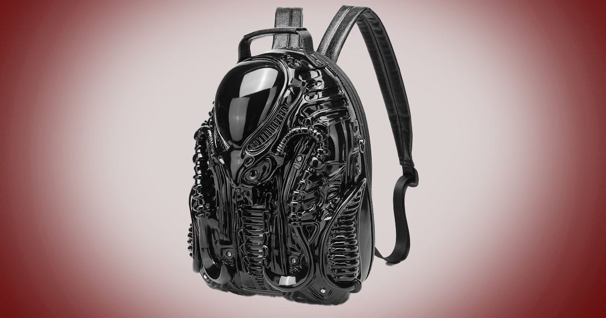 3D xenomorph shaped black science fiction backpack with sculpted alien design and glossy surface.