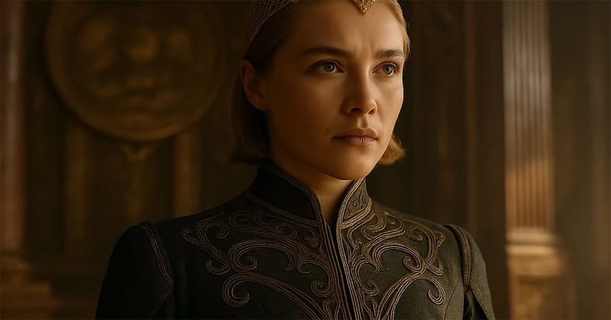 Princess Irulan standing in formal imperial court attire inside a grand chamber.