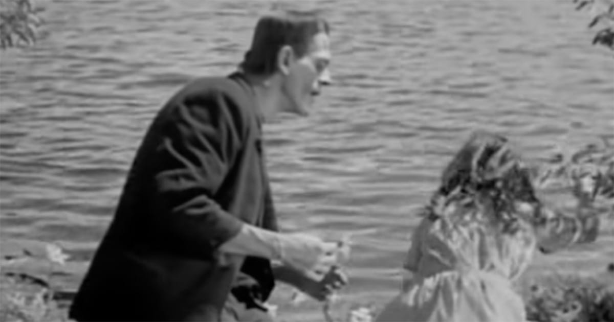 Outdoor scene from the 1931 film Frankenstein showing the creature by a lakeside with a young girl, emphasizing contrast between nature and human creation.