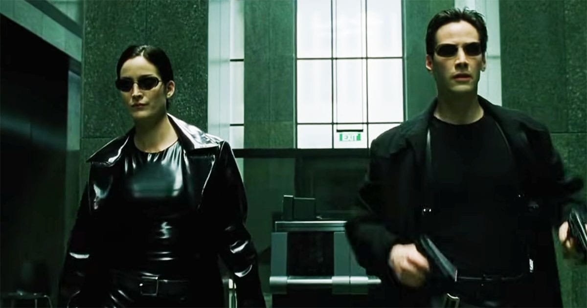 Neo and Trinity walking calmly through a corridor in The Matrix, representing confident viewers prepared to engage with the film’s ideas.