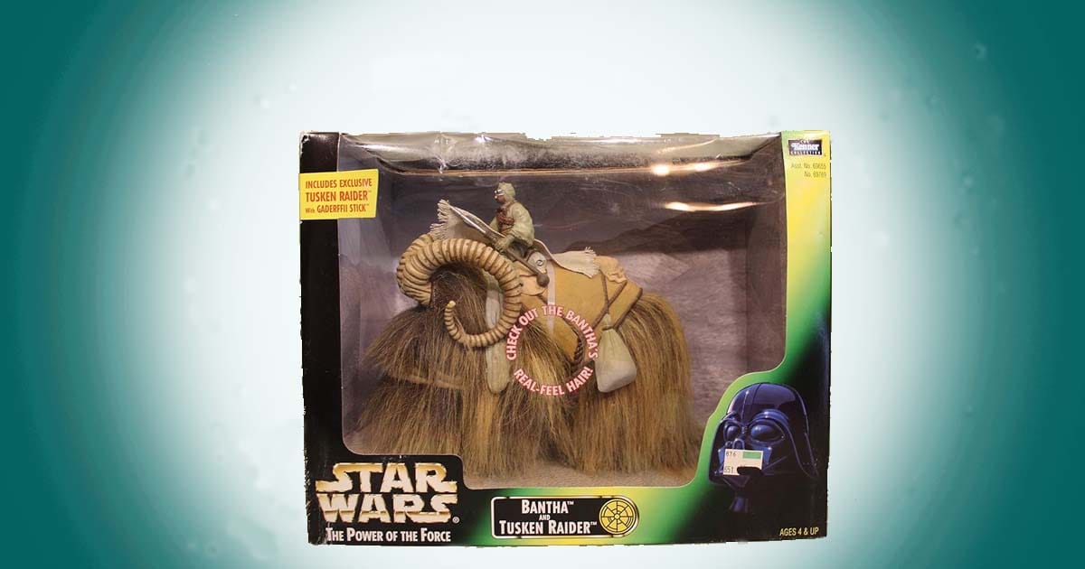 Star Wars Power of the Force Bantha and Tusken Raider action figure playset collectible in display box.