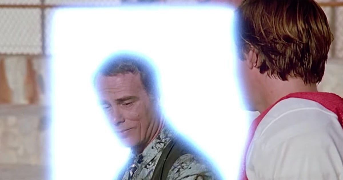 Sam Beckett and Al Calavicci standing together with glowing holographic effect in Quantum Leap.