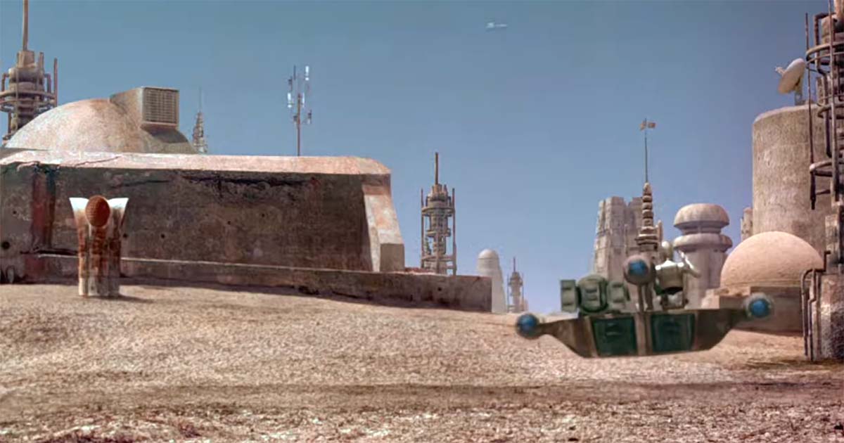 Tatooine desert buildings and landspeeder scene from Star Wars Episode IV A New Hope showing everyday life on the planet