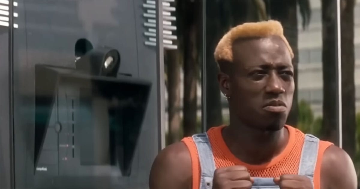 Simon Phoenix in futuristic San Angeles after escaping prison in Demolition Man 1993.