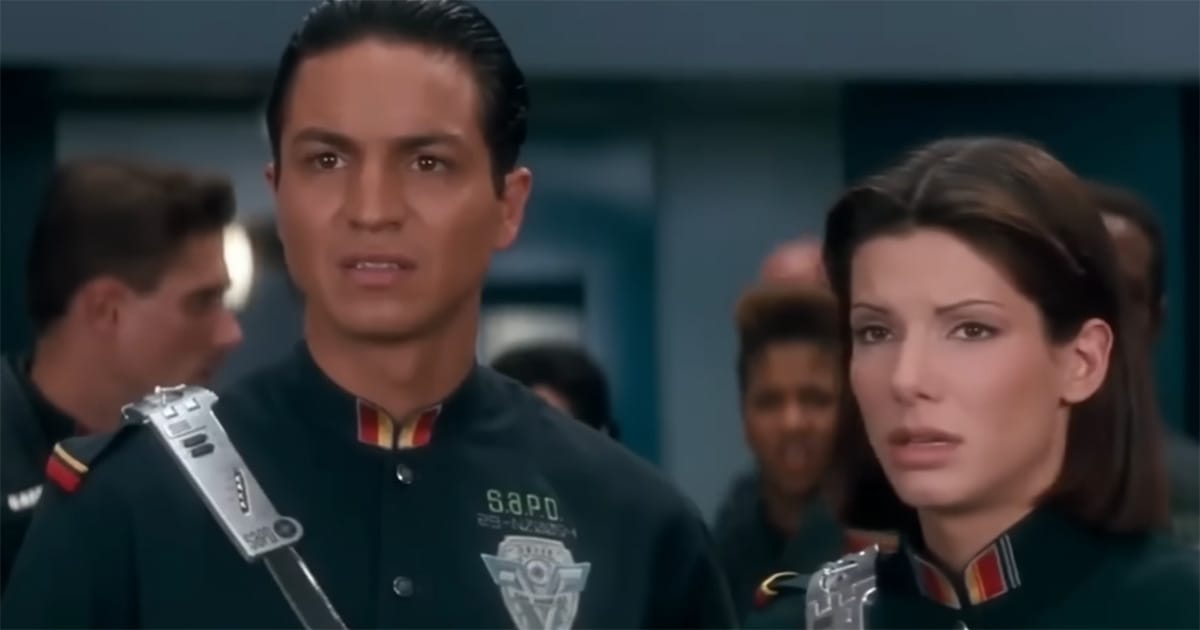 Lenina Huxley and San Angeles police officers react to violence in Demolition Man 1993.
