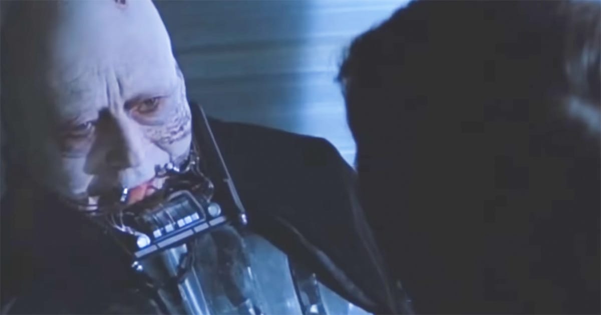 Unmasked Darth Vader speaks with Luke Skywalker in "Return of the Jedi," showing a final moment of reconciliation and redemption between father and son.