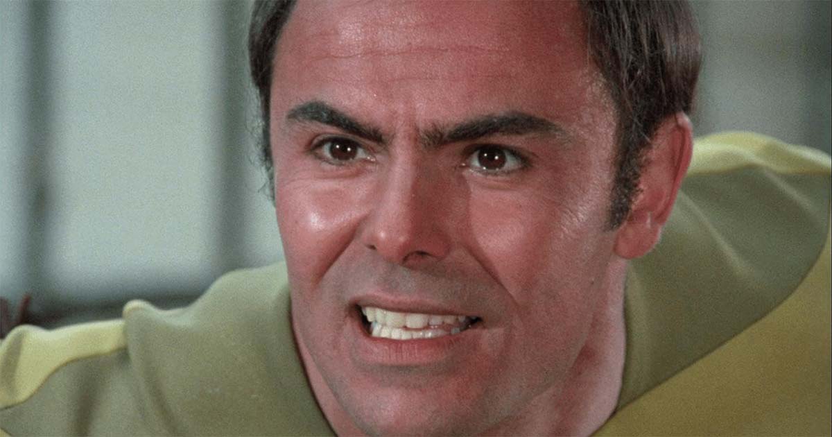 John Saxon dressed in futuristic attire as Dylan Hunt in the 1974 television film "Planet Earth"