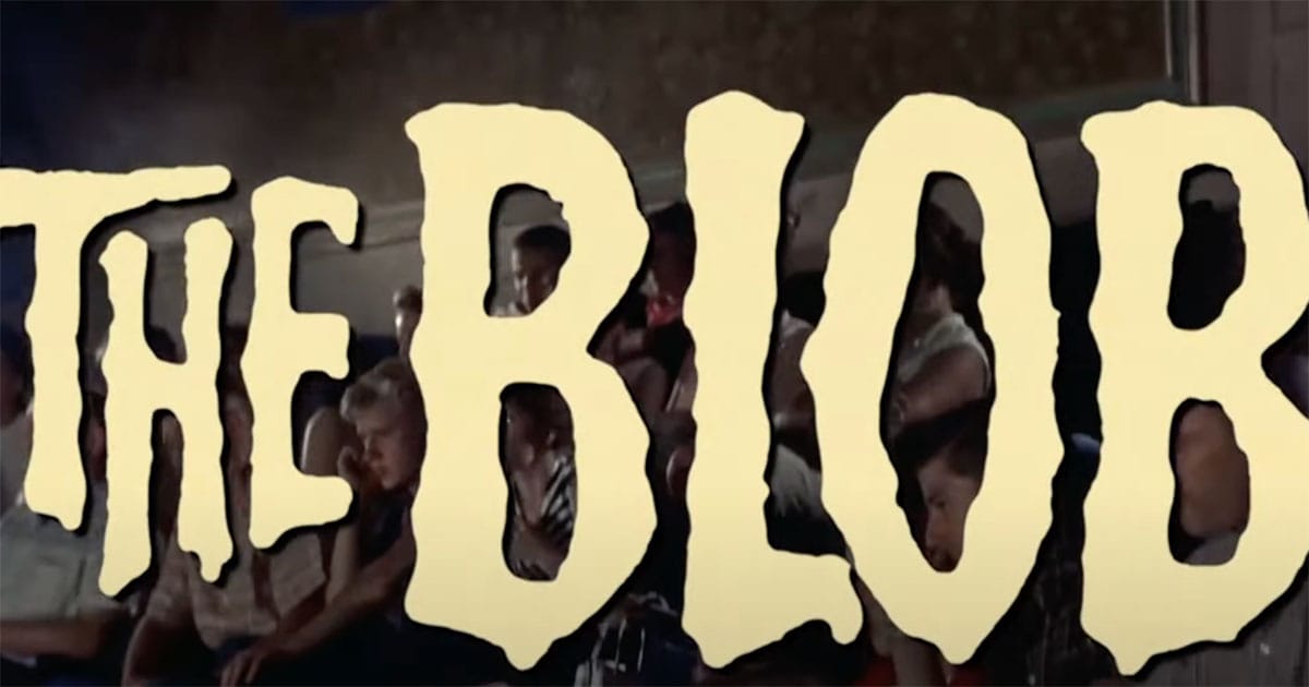 The Blob 1958 movie title card with audience watching in background.