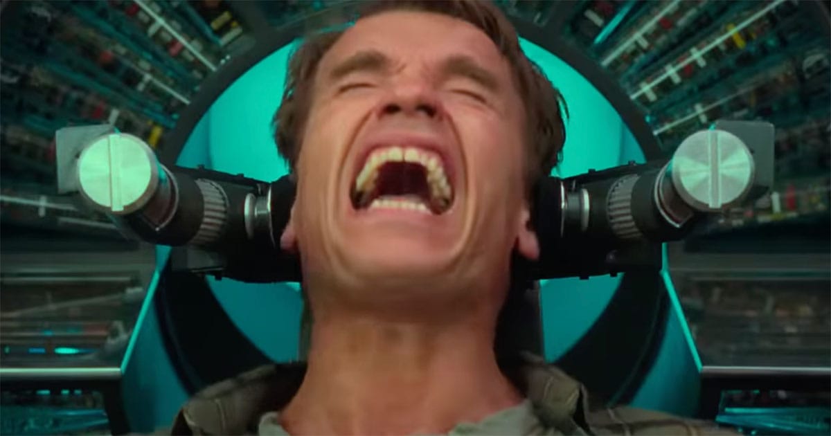 Total Recall 1990 scene showing Arnold Schwarzenegger as Douglas Quaid in Rekall memory chair exploring themes of reality and identity.