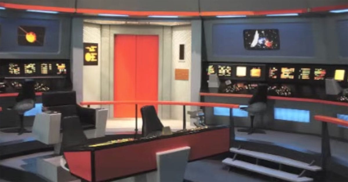 Centered red sliding doors on the bridge set of “Star Trek: The Original Series.”