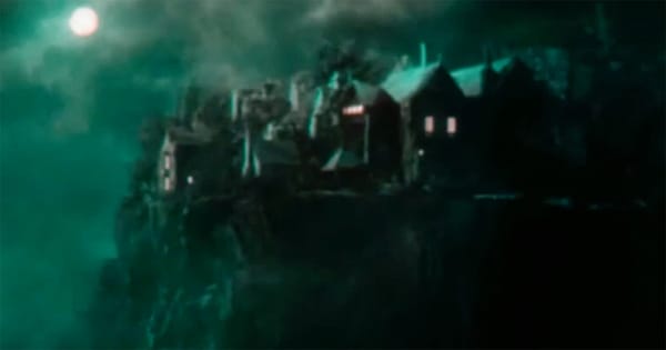 Cliffside mansion at night under green moonlight in "Doctor X" (1932) two-strip Technicolor film.