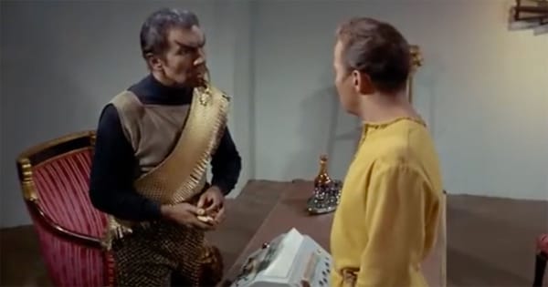 Captain Kirk and Klingon commander Kor speak face to face in Star Trek Errand of Mercy during a diplomatic confrontation.